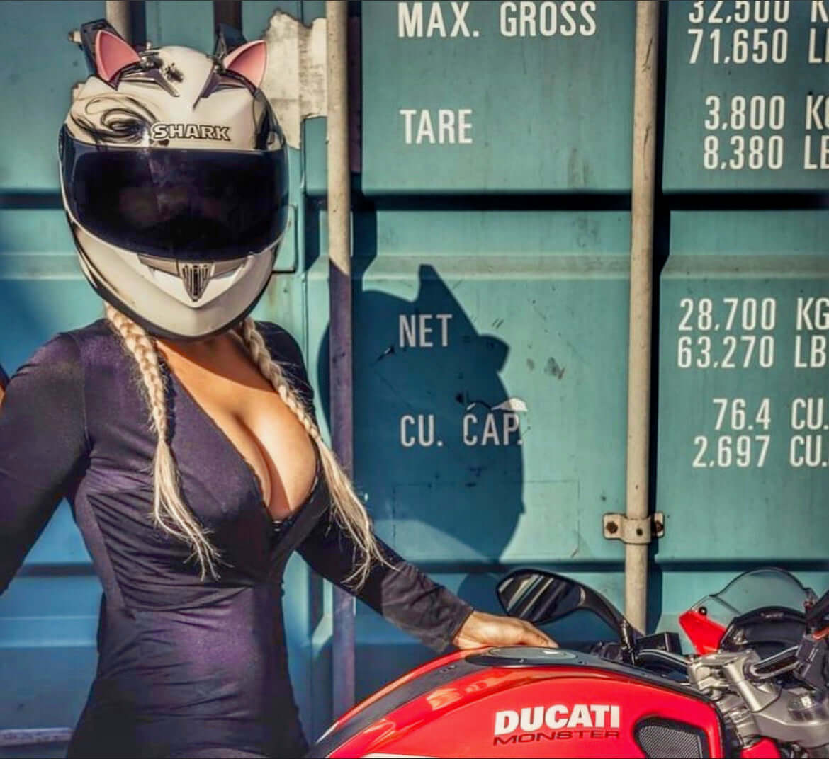 Pink cat ears on a motorcycle helmet