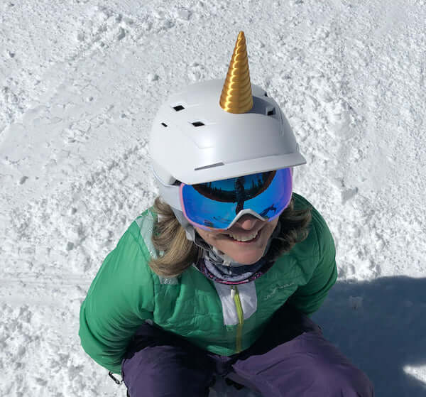 Unicorn horn for a snowboarding helmet with a snow background
