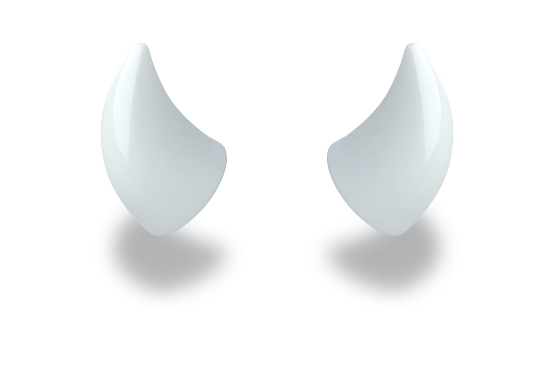 Small white devil horns for a helmet as an accessory